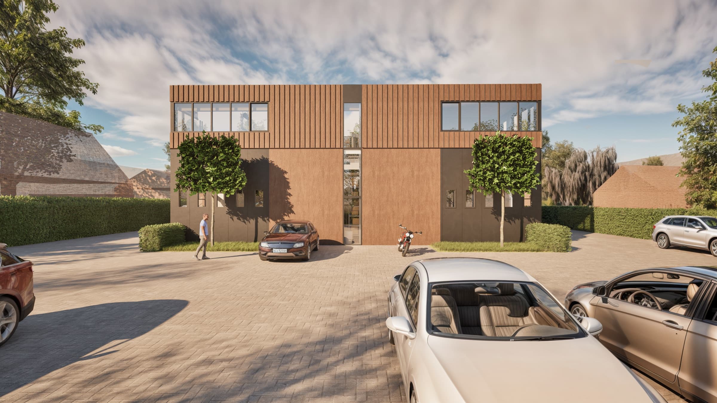 De achterzijde met de eigen parkeerplaatsen